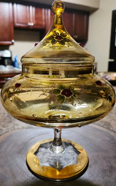 An amber glass candy dish, Tami’s great-grandparents’ 50th anniversary gift to each other