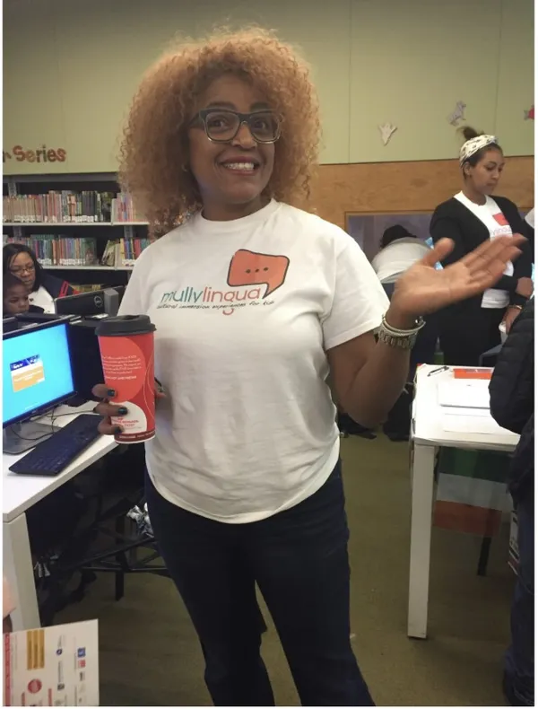 Tami in a Mully Lingua t-shirt at a cultural learning event in a library